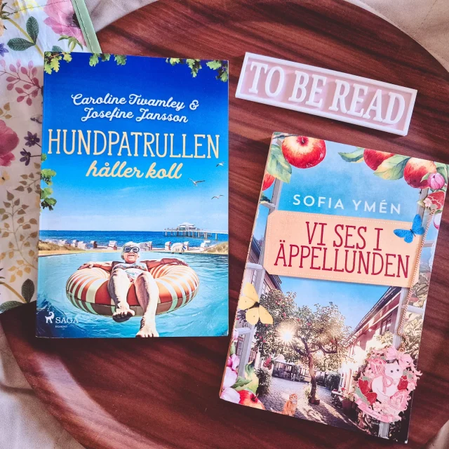 🌸 Sommaren är inte slut förrän sista augusti, så här kommer mer sommarböcker jag fått hem under semestern! 🌸

"Hundpatrullen håller koll" av Caroline Twamley och Josefine Jansson
Sommaren har återvänt till kvarteret Svartgåsen. Under julis varma dagar vankas det födelsedagsfirande för Margareta, och Viola och Konrad har hittat den perfekta presenten - en sparesa till Polen. Under vännernas bortavaro kliver Gerda in som hundvakt åt Killen och genom henne får Viola och gänget höra att allt inte är frid och fröjd där hemma på Svartgåsen. En mystisk nyanställd hos hyresgästföreningen tillbringar ovanligt mycket tid i kvarteret med sin stora läskiga hund, och när en granne plötsligt försvinner vet inte gänget vad de ska tro. Är det en kidnappare lös i grannskapet?

📚 Jag har börjat på första delen i Hundpatrullen, så kanske tar och läser hela serien i ett svep nu när tredje delen kommit! 😇

"Vi ses i Äppellunden" av Sofia Ymén
Sommaren har anlänt till Varberg, men i Äppellunden är lyckan bitterljuv. Ett år efter att Max förlorat sin älskade Margit börjar hans barn ifrågasätta hans förmåga att ta vara på sig själv. Det är då Rosa kommer in i bilden. Med sin viljestyrka och den godhjärtade Solveig till hjälp, är de fast beslutna att hjälpa Max vara kvar i hans älskade Äppellunden.

Rosa blir ett ovärderligt stöd och när hennes syster Fredrika, som kämpar med sin återhämtning från utbrändhet, blir indragen i Max problem inser de alla att de har mer gemensamt än de trott.

Samtidigt är Patrik borta på uppdrag med Läkare utan gränser. Rosa och Patrik håller kontakten, men att vara ifrån varandra har satt sina spår. När Patrik väl återvänder förväntar sig Rosa hans stöd, men står de verkligen på samma sida? Kommer Max strid om Äppellunden att driva dem isär, eller vara startpunkten på den andra chans som i alla fall Patrik hoppats på?

📚 Jag läste den första boken, "En önskan om julefrid" och har längtat efter en fortsättning. Nu är den här! 🥰

#hundpatrullenhållerkoll
#carolinetwamley #josefinejansson #visesiäppellunden #sofiaymen #SagaEgmont #sommarläsning #boktips @sagasverige @sofia_ymen @writer_carolinetwamley @jjanssons_bocker_o_godsaker